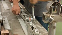 HD TILT-DOWN : Worker tighten nut Stock Footage