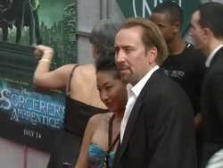 Alice Kim and Nicolas Cage at the 'The Sorcerer's Apprentice' New York Premiere - Arrivals  Stock Footage