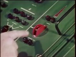 1960s close up man's hand pushing red switch on control panel to shoot missiles / Cold War / documentary Stock Footage