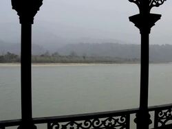 MS PAN Shot of ganges river with mountains in background / Rishikesh, Uttarakhand, India Stock Footage