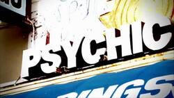 Signs advertise tarot readings and a psychic. Stock Footage