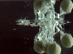 CU SLO MO Shot of Pears falling into water / Seoul, South Korea Stock Footage