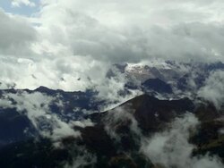 Clouds Moving Over Dolomites Mountains PAN Stock Footage