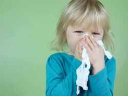 Little girl blowing nose Stock Footage
