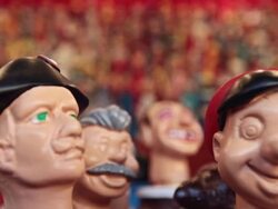 CU R/F Shot of artisan figurines of Silvio Berlusconi, carabiniere and pinocchio in historical Christmas Market of Piazza Novena / Rome, Italy Stock Footage