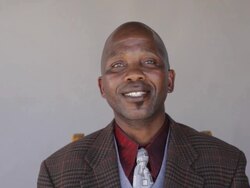 African man smiling and talking with joy Stock Footage