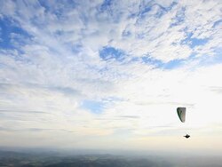 WS Shot of Para glider flying in air over mountain hill / Belo Horizonte, Minas Gerais, Brazil Stock Footage