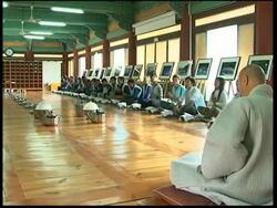 Tourists experience life in a Buddhist Temple News Clip