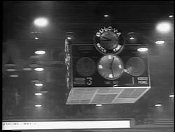B/W 1961 low angle clock + timer in Olympia Stadium during Stanley Cup / Detroit / newsreel Stock Footage