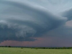 WS PAN View of mothership supercell storm over farmland / Oklahoma, United States Stock Footage
