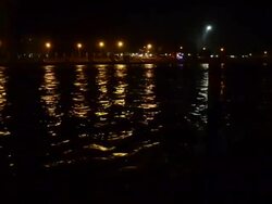 WS People praying in ganges river bank at night / Haridwar, Uttarakhand, India Stock Footage