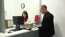 Post office - sending a parcel (Dolly) Stock Footage