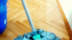 Cleaning the floor with a mop. Stock Footage