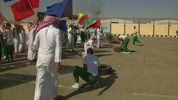 Angry protestors clash with soldiers on a military base in Saudi Arabia. Stock Footage