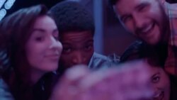 Group of friends pose for crazy selfies in nightclub in slow motion Stock Footage