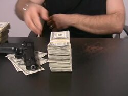 Criminal transaction. Cash. Money. Gun. Stock Footage