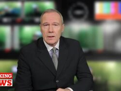 Senior male Newsreader in television studio Stock Footage