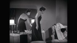 MS ZO Woman wearing coat and smiling in her dressing room / United States Stock Footage