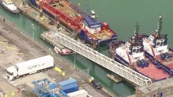 Aerials of border force patrol boat and migrant dinghies News Clip