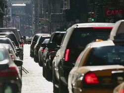 MS Shot of cars running on shining Stone pavement street at SOHO / New York, United States Stock Footage