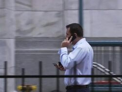 Trader Speaking On Cell Phone Outside NYSE Stock Footage