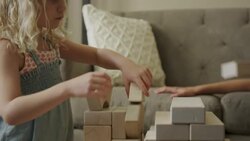 Close up view of girls playing with building blocks / Orem, Utah, United States Stock Footage