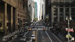 Traffic and pedestrians move along 42nd Street near Grand Central Station. Stock Footage