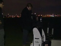 Astronomers with Telescopes News Clip