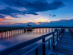 Beautiful Sunset Sky over Wood Bridge  Timelapse Stock Footage