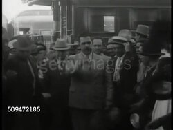 1934: MEXICO PRESIDENT:  MS Lazaro Cardenas walking through crowd from train, shaking hands (Questionable Quality: frame skips). Instructional Video