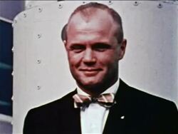 1959 close up PORTRAIT astronaut John Glenn wearing bow tie smiling / newsreel Stock Footage