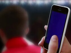 Football smartphone cheering fans. Stock Footage