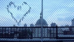 Heart on a wire fence in Brooklyn Stock Footage