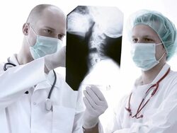 Doctor reviews x-ray Stock Footage
