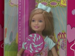 Various toy shleves in Target featuring balls, dolls, games Stock Footage