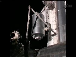 NASA's orbiting astronauts detached a huge storage bin full of trash from the International Space Station on Monday and loaded it aboard Atlantis for the last shuttle ride back to Earth. News Clip