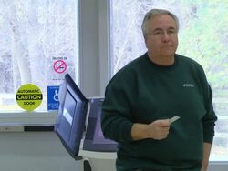 MS Shot of male voter walking in presidential election at union hall / Sylvania, Ohio, United States  Stock Footage