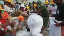 Fire breaks out in rubble of collapsed building News Clip