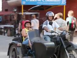 MS TS Shot of Motorcycle moving onHavana busy street / Havana, Cuba  Stock Footage