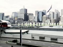 Mono Rail leaving Darling Harbour Station with CBD as Background, Sydney, New South Wales, Australia Stock Footage