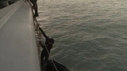 Onboard navy vessel as divers continue search for missing News Clip