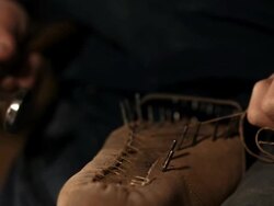 HD Super Slow-Mo: Welting A Shoe Stock Footage