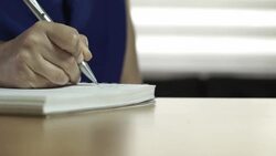 Slider Shot: Close Up of Businesswoman Handwriting Stock Footage