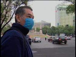 Morning pix, people going to work, newspapers, amid swine flu outbreak News Clip