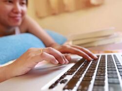 Woman using laptop Stock Footage