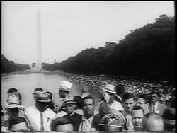 B/W August 28, 1963 crowd by reflecting pool in Mall at March on Washington / newsreel Stock Footage