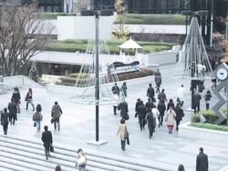 People going to work early morning in Shinjuku, Tokyo, Japan Stock Footage