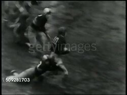 Muddy game play, cheerleaders, crowd Instructional Video