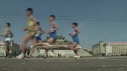 CLEAN : High-fives and presidential portraits at Pyongyang Marathon News Clip