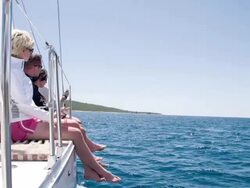 WS People Sitting On A Sailboat Stock Footage